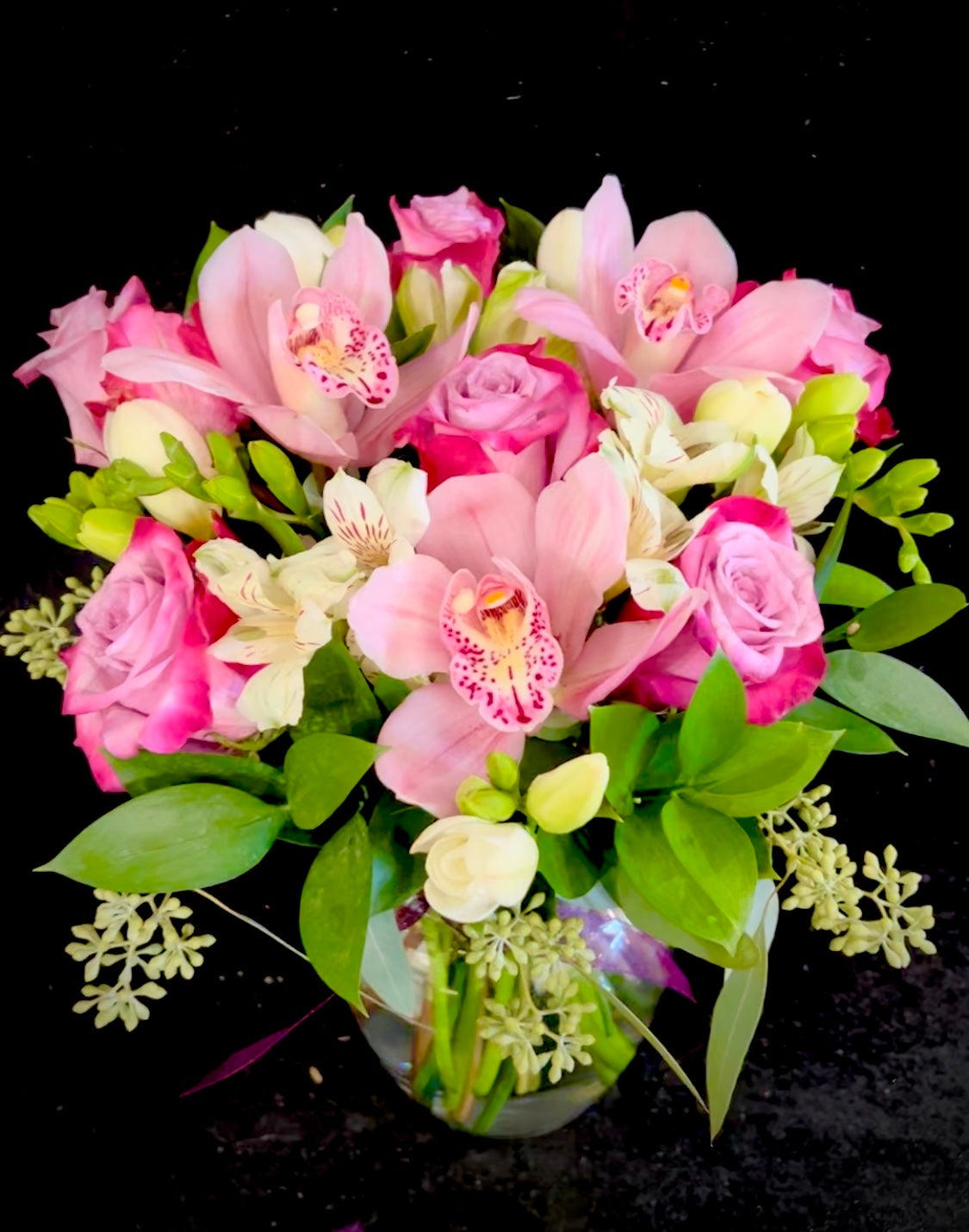 Roses, cymbidium orchids and seasonal blooms mix-Next Delivery San Fernando Valley